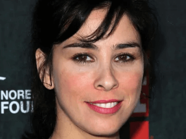 Sarah Silverman's estimated net worth of $25 million reflects her impressive accomplishments in both comedy and acting, showcasing her ability to navigate and thrive in the entertainment industry. From her breakout stand-up performances to her influential television series, Silverman has crafted a distinctive brand that resonates with a broad audience. Furthermore, her contributions extend beyond entertainment, encompassing writing and philanthropy. However, the nuances of her financial success and the strategies behind her career choices raise intriguing questions about the balance of artistry and commerce in her journey. What insights can we glean from her trajectory? ## Early Life and Career Beginnings Born into a Jewish family in Bedford, New Hampshire, Sarah Silverman's early life laid the foundation for her distinctive comedic voice. Her family background fostered a rich cultural environment, while her childhood interests in performance and storytelling ignited her passion for comedy. These formative experiences not only shaped her perspective but also equipped her with a unique lens through which she explores societal norms and taboos. ## Stand-Up Comedy Breakthrough Sarah Silverman's ascent in the world of stand-up comedy can be traced through her early career highlights and the release of her iconic comedy specials. These pivotal moments not only showcased her unique voice and unfiltered humor but also solidified her status as a trailblazer in the industry. ### Early Career Highlights The emergence of stand-up comedy as a prominent platform for personal expression marked a significant turning point in the entertainment industry during the 1990s. Sarah Silverman swiftly navigated this landscape, drawing on diverse comedy influences to craft her unique voice. Key career milestones, including her performances at renowned venues and television appearances, established her as a formidable presence, challenging norms and redefining comedic boundaries. ### Iconic Comedy Specials Breaking through the stand-up comedy scene, Silverman captivated audiences with her bold and unapologetic comedic style showcased in several iconic specials. Her sharp cultural commentary and unique comedic influences, drawn from personal experiences and societal observations, challenged conventions and sparked conversations. Each performance offered a blend of humor and introspection, establishing her as a significant voice in contemporary comedy and enriching the genre's landscape. ## Television Success and Impact Silverman's television success has established her as a formidable force in the entertainment industry, blending sharp wit with social commentary. Her pioneering television milestones have not only entertained but also sparked essential dialogues about societal issues, making her a key player in cultural commentary. | Television Show | Impact | |------------------------|---------------------------------------| | The Sarah Silverman Program | Redefined sketch comedy with bold topics | | I Love You, America | Engaged audiences in political discourse | | Sarah Silverman: We Are Miracles | Highlighted personal storytelling | ## Film Roles and Box Office Performance Sarah Silverman has made a significant mark in the film industry with a variety of notable roles that showcase her unique comedic talent. Her performances in films such as "Wreck-It Ralph" and "A Million Ways to Die in the West" not only highlight her versatility but also contribute to impressive box office performances. Analyzing her filmography reveals how her presence has influenced both audience reception and financial success at the box office. ### Notable Film Appearances Showcasing her versatility as a performer, Sarah Silverman has made significant contributions to the film industry through a variety of notable roles. Her film diversity is evident in: 1. **"Wreck-It Ralph"** - voicing the iconic Vanellope von Schweetz. 2. **"A Million Ways to Die in the West"** - portraying the sharp-witted Ruth. 3. **"I Smile Back"** - embodying the complex character of Laney Brooks. Sarah's characters resonate deeply with audiences, reflecting her unique comedic and dramatic range. ### Box Office Highlights The impact of Sarah Silverman's film roles extends beyond her memorable performances; it is also reflected in the box office success of her projects. Analyzing box office trends reveals a consistent pattern of strong audience engagement, often complemented by critical reception that highlights her unique comedic style. Silverman's ability to attract viewers ensures that her films not only entertain but also achieve financial success. ## Writing and Publishing Ventures Numerous writing and publishing ventures have contributed significantly to Sarah Silverman's financial success and artistic identity. Her impact extends through various channels, showcasing her talent in humor writing and literary influence. Key highlights include: 1. **Book Publishing** - Her memoir "The Bedwetter" reflects her unique voice. 2. **Writing Projects** - Collaborations amplify her creative reach. 3. **Humor Writing** - Stand-up specials demonstrate her narrative prowess. ## Awards and Nominations Throughout her career, Sarah Silverman has consistently garnered critical acclaim, reflected in a myriad of awards and nominations that underscore her influence in the entertainment industry. Her award achievements include multiple Primetime Emmy Awards, showcasing her talent in comedy and acting. Silverman's nomination history further highlights her versatility, as she continues to challenge norms and engage audiences with her candid, thought-provoking material. ## Endorsements and Sponsorships Leveraging her unique comedic voice and widespread appeal, Sarah Silverman has successfully secured numerous endorsements and sponsorships that reflect her brand's alignment with various industries. These brand partnerships enhance her visibility, particularly on social media platforms. Key collaborations include: 1. Innovative product campaigns 2. Lifestyle brands targeting diverse audiences 3. Charitable initiatives that resonate with her fanbase These partnerships amplify her influence and financial success. ## Philanthropy and Activism Sarah Silverman's commitment to philanthropy and activism showcases her dedication to social causes that resonate deeply with her values and audience. Through various activism initiatives, she addresses critical issues such as mental health, LGBTQ+ rights, and social justice. Her charitable contributions reflect a genuine desire to effect change, inspiring others to engage in meaningful discourse and action for a more equitable society. ## Current Net Worth Estimate An estimated net worth of approximately $25 million underscores Sarah Silverman's success in the entertainment industry. This current wealth reflects her substantial financial growth through various avenues, including: 1. Stand-up comedy specials 2. Television and film roles 3. Writing and producing projects Silverman's diverse portfolio not only showcases her talent but illustrates her strategic approach to maximizing opportunities in a competitive landscape. ## Conclusion In summation, Sarah Silverman's illustrious career weaves a rich tapestry of humor and artistry, illuminating the entertainment landscape with her distinctive voice. From the vibrant stages of stand-up comedy to the poignant narratives of television and film, Silverman's multifaceted contributions resonate deeply with audiences. Furthermore, her ventures in writing and philanthropy reflect a commitment to both creativity and social impact, solidifying her status as a formidable force in the industry and a beacon of inspiration for aspiring artists.